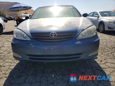 Piąte zdjęcie samochodu w środku: 2004 TOYOTA CAMRY XLE V6 VIN:JTDBF32K140152981 - miniatura
