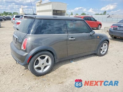 Trzecie zdjęcie samochodu z tyłu: 2006 MINI COOPER VIN:WMWRC33536TK71324 - miniatura