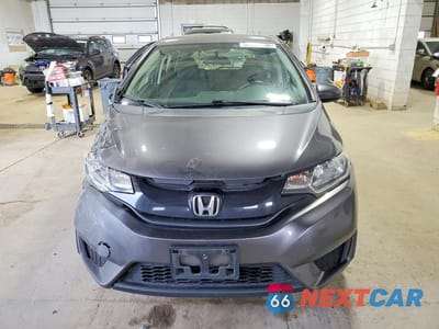 Piąte zdjęcie samochodu w środku: 2016 HONDA FIT LX VIN:JHMGK5H52GX041039 - miniatura