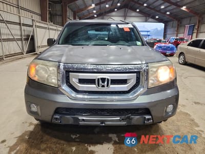 Piąte zdjęcie samochodu w środku: 2011 HONDA PILOT EXLN VIN:5FNYF3H73BB043188 - miniatura