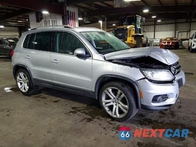 Czwarte zdjęcie samochodu z boku: 2012 VOLKSWAGEN TIGUAN S VIN:WVGBV7AX9CW535260 - miniatura