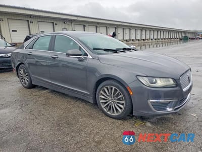 Czwarte zdjęcie samochodu z boku: 2017 LINCOLN MKZ PREMIERE VIN:3LN6L5B9XHR628164 - miniatura