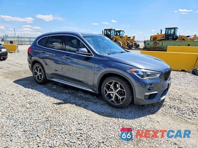 Czwarte zdjęcie samochodu z boku: 2016 BMW X1 XDRIVE28I VIN:WBXHT3C3XG5F64985 - miniatura