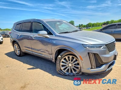 Czwarte zdjęcie samochodu z boku: 2022 CADILLAC XT6 PLATINUM PREMIUM LUXURY VIN:1GYKPFRS9NZ149502 - miniatura
