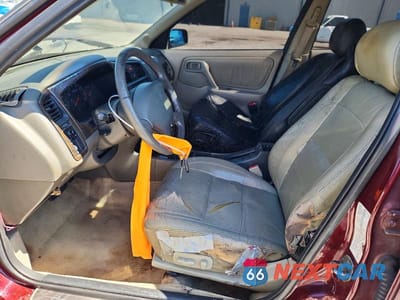 Zdjęcie 7 z 12 samochodu: 2002 INFINITI G20 BASE VIN:JNKCP11A42T509787 - miniatura