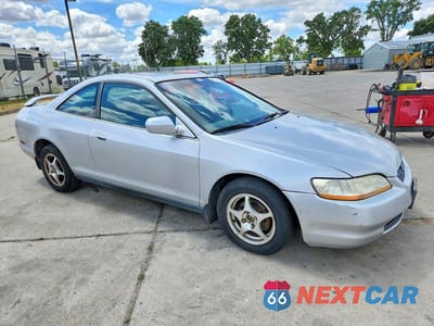 Czwarte zdjęcie samochodu z boku: 1999 HONDA ACCORD LX VIN:1HGCG3262XA015939 - miniatura