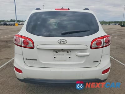 Zdjęcie 6 z 13 samochodu: 2012 HYUNDAI SANTA FE GLS VIN:5XYZGDABXCG163554 - miniatura