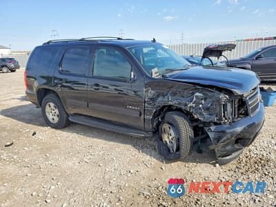 Czwarte zdjęcie samochodu z boku: 2011 CHEVROLET TAHOE K1500 LS VIN:1GNSKAE00BR115575 - miniatura
