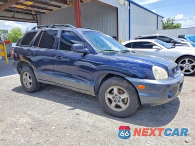 Czwarte zdjęcie samochodu z boku: 2004 HYUNDAI SANTA FE GLS VIN:KM8SC13E44U582210 - miniatura