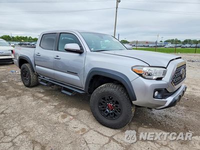 Czwarte zdjęcie samochodu z boku: 2019 TOYOTA TACOMA TRD OFF-ROAD VIN:3TMCZ5AN4KM242140 - miniatura