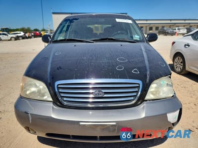Piąte zdjęcie samochodu w środku: 2003 KIA SEDONA LX VIN:KNDUP131136444609 - miniatura