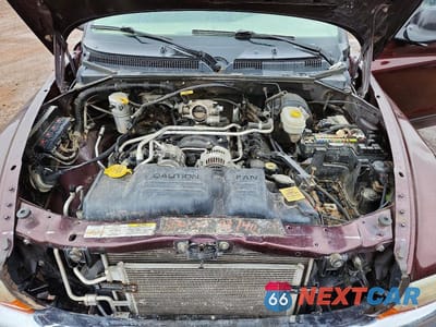 Zdjęcie 11 z 12 samochodu: 2004 DODGE DAKOTA QUAD SLT VIN:1D7HG48NX4S556273 - miniatura