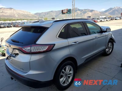 Trzecie zdjęcie samochodu z tyłu: 2017 FORD EDGE SEL VIN:2FMPK4J93HBB04498 - miniatura