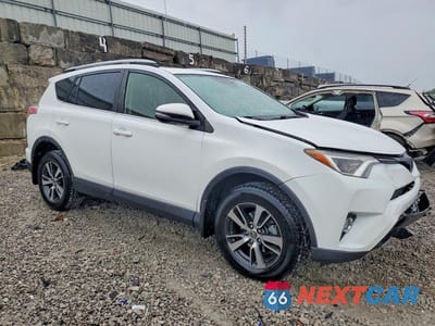 Czwarte zdjęcie samochodu z boku: 2018 TOYOTA RAV4 XLE VIN:JTMRFREV8JJ244845 - miniatura