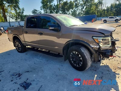 Czwarte zdjęcie samochodu z boku: 2023 NISSAN TITAN SV VIN:1N6AA1ED9PN118853 - miniatura