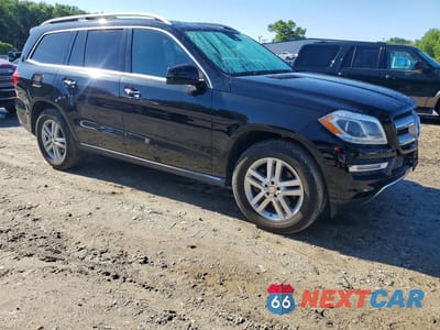 Czwarte zdjęcie samochodu z boku: 2014 MERCEDES-BENZ GL 450 4MATIC VIN:4JGDF7CE8EA326108 - miniatura