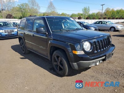 Czwarte zdjęcie samochodu z boku: 2014 JEEP PATRIOT SPORT VIN:1C4NJPBA9ED774720 - miniatura