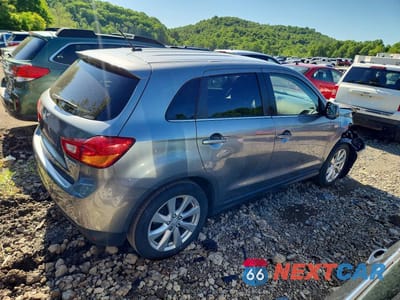 Trzecie zdjęcie samochodu z tyłu: 2013 MITSUBISHI OUTLANDER SPORT SE VIN:4A4AR4AU1DE008659 - miniatura