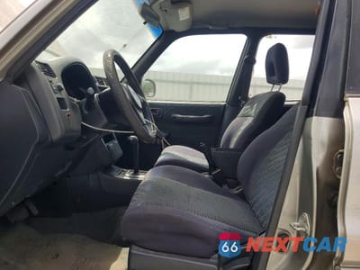 Zdjęcie 7 z 13 samochodu: 2000 TOYOTA RAV4 BASE VIN:JT3GP10V7Y7067004 - miniatura