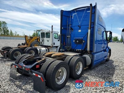 Czwarte zdjęcie samochodu z boku: 2022 VOLVO VNL SEMI TRUCK VIN:4V4NC9EH2NN318202 - miniatura