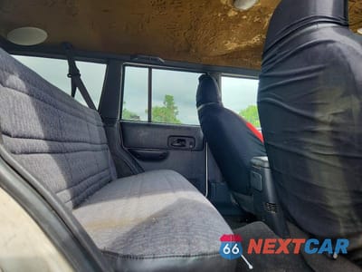 Zdjęcie 11 z 13 samochodu: 2000 JEEP CHEROKEE SE VIN:1J4FF28S5YL257671 - miniatura