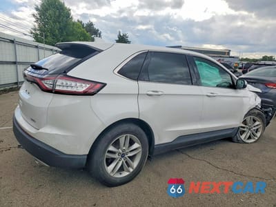 Trzecie zdjęcie samochodu z tyłu: 2015 FORD EDGE SEL VIN:2FMTK3J86FBB37606 - miniatura