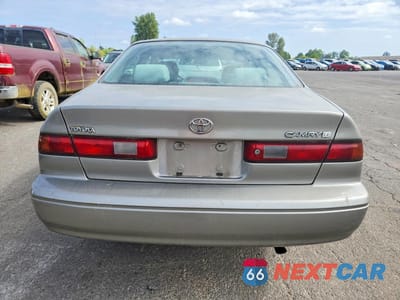 Zdjęcie 6 z 12 samochodu: 1997 TOYOTA CAMRY LE VIN:JT2BG22K3V0072065 - miniatura