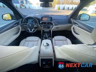 Zdjęcie 9 z 14 samochodu: 2021 BMW X3 XDRIVE30E VIN:5UXTS1C08M9F18949 - miniatura