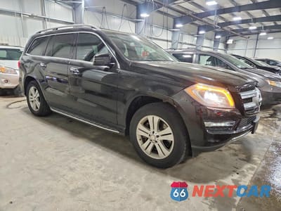 Czwarte zdjęcie samochodu z boku: 2014 MERCEDES-BENZ GL 450 4MATIC VIN:4JGDF7CE8EA276990 - miniatura
