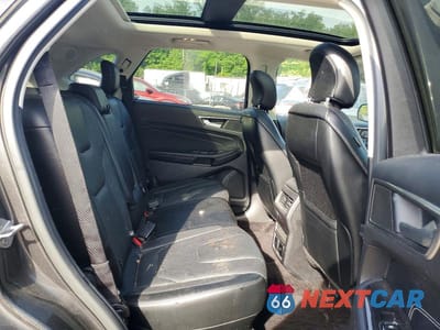 Zdjęcie 10 z 12 samochodu: 2016 FORD EDGE TITANIUM VIN:2FMPK4K96GBC23918 - miniatura