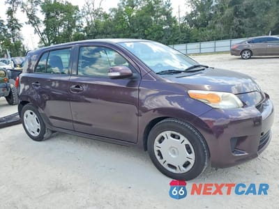 Czwarte zdjęcie samochodu z boku: 2011 SCION XD BASE VIN:JTKKU4B48B1009765 - miniatura