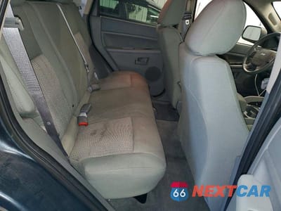 Zdjęcie 11 z 13 samochodu: 2007 JEEP GRAND CHEROKEE LAREDO VIN:1J8GR48K97C629100 - miniatura