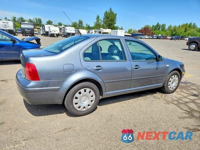 Trzecie zdjęcie samochodu z tyłu: 2003 VOLKSWAGEN JETTA GL VIN:3VWRK69M53M198079 - miniatura