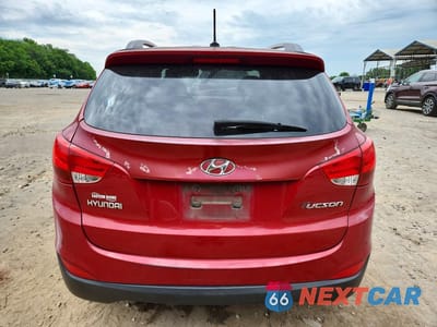 Zdjęcie 6 z 14 samochodu: 2011 HYUNDAI TUCSON GLS VIN:KM8JU3ACXBU120561 - miniatura