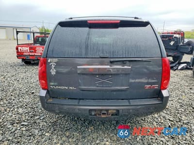 Zdjęcie 6 z 13 samochodu: 2010 GMC YUKON XL K1500 SLT VIN:1GKUKKE35AR239149 - miniatura