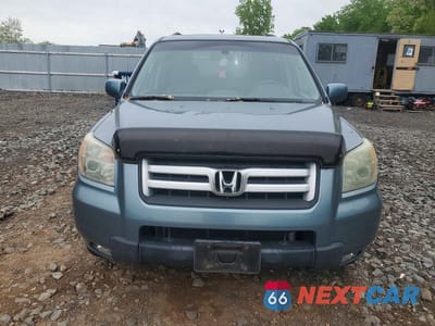 Piąte zdjęcie samochodu w środku: 2006 HONDA PILOT EX VIN:2HKYF18636H519488 - miniatura