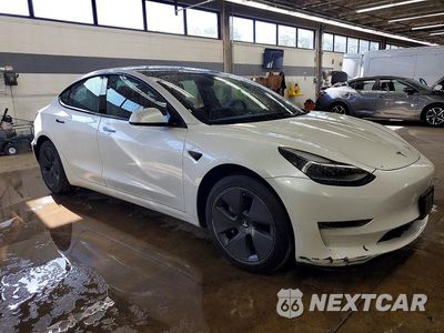 Czwarte zdjęcie samochodu z boku: 2022 TESLA MODEL 3 VIN:5YJ3E1EA9NF372564 - miniatura