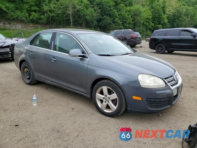Czwarte zdjęcie samochodu z boku: 2008 VOLKSWAGEN JETTA SE VIN:3VWRM71K08M028892 - miniatura