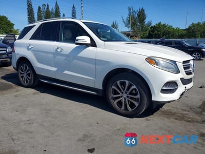 Czwarte zdjęcie samochodu z boku: 2016 MERCEDES-BENZ GLE 350 4MATIC VIN:4JGDA5HB2GA731658 - miniatura