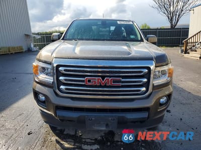 Piąte zdjęcie samochodu w środku: 2016 GMC CANYON SLE VIN:1GTH6CE36G1101747 - miniatura
