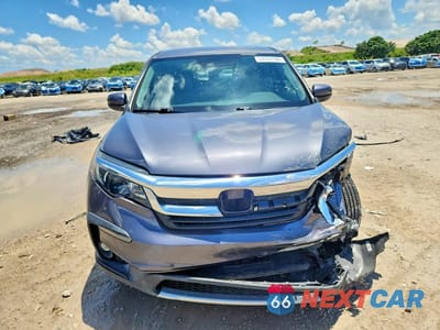 Piąte zdjęcie samochodu w środku: 2021 HONDA PILOT EX VIN:5FNYF5H30MB023394 - miniatura