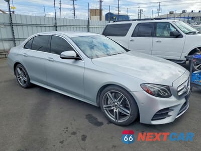 Czwarte zdjęcie samochodu z boku: 2018 MERCEDES-BENZ E 300 VIN:WDDZF4JB7JA431563 - miniatura