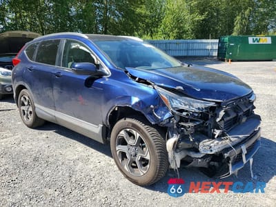 Czwarte zdjęcie samochodu z boku: 2018 HONDA CR-V TOURING VIN:2HKRW2H94JH602182 - miniatura