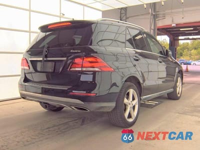 Czwarte zdjęcie samochodu z boku: 2016 MERCEDES-BENZ GLE 350 4MATIC VIN:4JGDA5HB5GA805736 - miniatura