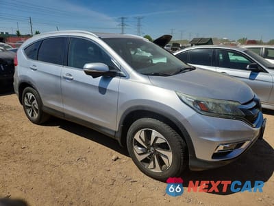 Czwarte zdjęcie samochodu z boku: 2016 HONDA CR-V VIN:5J6RM4H94GL004903 - miniatura