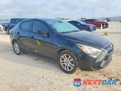Czwarte zdjęcie samochodu z boku: 2016 SCION IA BASE VIN:3MYDLBZV0GY108607 - miniatura