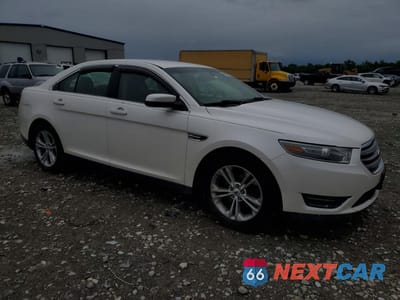 Czwarte zdjęcie samochodu z boku: 2014 FORD TAURUS SEL VIN:1FAHP2E8XEG149898 - miniatura