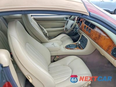Zdjęcie 10 z 12 samochodu: 2000 JAGUAR XK8 VIN:SAJJA42C7YNA03402 - miniatura