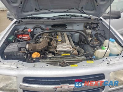 Zdjęcie 12 z 13 samochodu: 1999 CHEVROLET TRACKER VIN:2CNBJ13C8X6917086 - miniatura