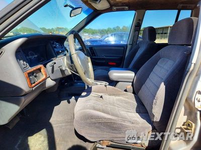 Zdjęcie 7 z 13 samochodu: 1998 JEEP GRAND CHEROKEE LAREDO VIN:1J4FX58S5WC340903 - miniatura